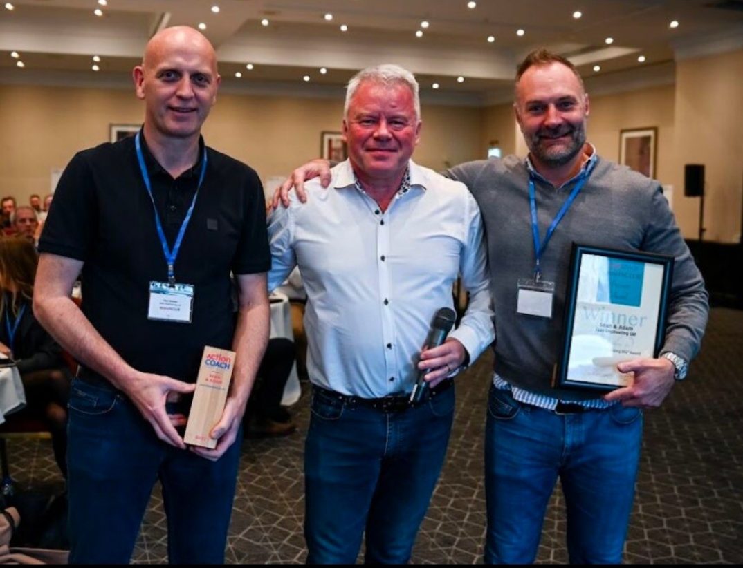 Sean Mackey and Adam Jones of Jade with ActionCOACH business coach Mark Jennings